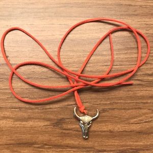 Orange leather choker with gold longhorn